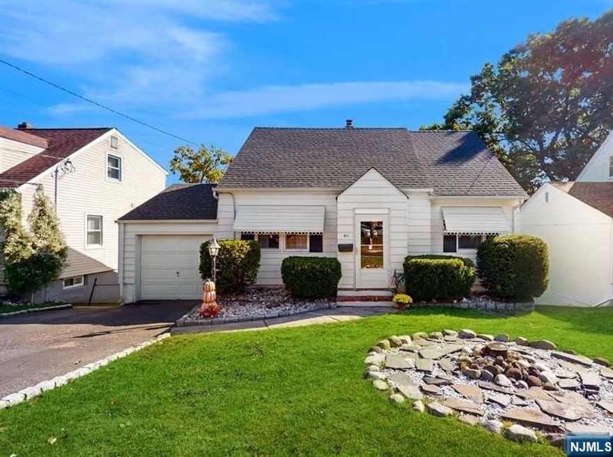 Remarks: Welcome Home to this spacious, bright & airy 2 bedrooms Cape Cod! Located in a desirable section of Clifton! The first Fl offers a large living room, 2 good size bedrooms, a full bathroom and a Sunlit filled large EIK with sliding doors to a private deck with seasonal NY views! The second fl. has a fantastic attic space where you can practice your designer skills and add your Own Touch! In the finished basement you will find the laundry area, half bathroom and a family room that lead you to the back yard. The nice size garage complete the great value this home has to offer! Close to transportation, restaurants and shops. Come Visit Us!