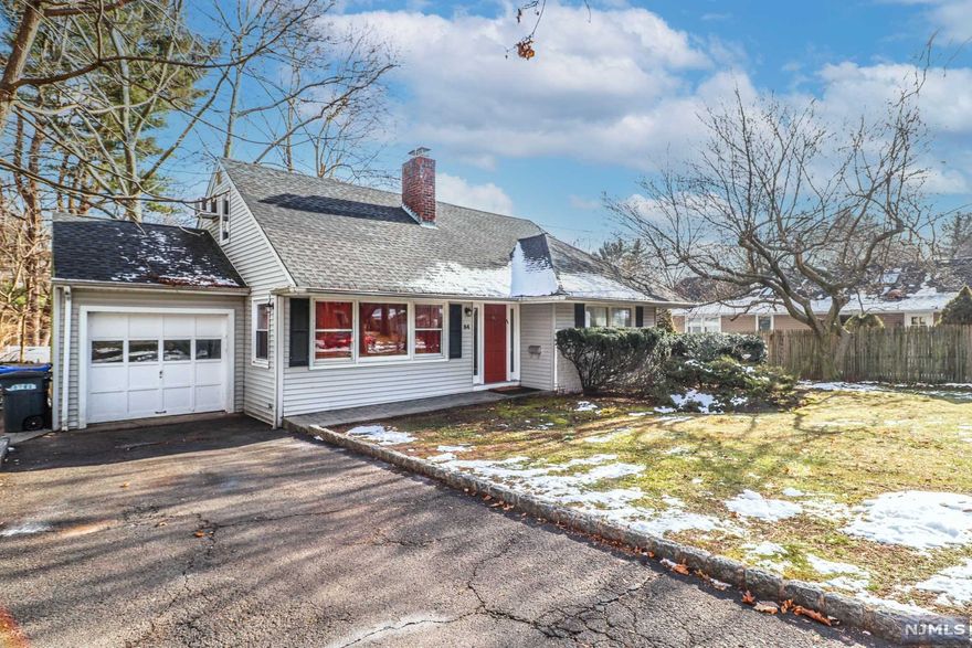 Picturesque 4BR/4BA Raised Ranch in Tenafly's Country Club section. Over 2700sf on a deep lot. Three great Bedrooms on the main floor, with two Bathrooms; one en-suite, and the other with jetted tub. Living Room flows into the bay-windowed Dining Room, and on to the recently renovated Eat-in Kitchen with additional breakfast bar, stone counters, and stainless-steel appliances including vented range hood. Primary bedroom suite is an oasis by itself on the second floor, with skylights, Walk-in Closet/Dressing Room, and Bathroom. Finished basement includes Family Room, separate room that's perfect for a gym or Home Office, and full Bathroom that includes laundry. Massive storage space also in basement. Spacious backyard includes great deck for relaxing and entertaining. Walking distance to Knickerbocker Country Club, Sunnyside Park, Tenafly Public Schools, Houses of Worship, Downtown Tenafly, and transportation to NYC.