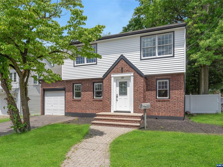 Welcome to this stunning, fully renovated 3 Bedroom, 3 Bath Center Hall Colonial. Enjoy the open concept design, recessed lighting, and airy atmosphere with beautiful oak hardwood floors. The main level features a dining area flowing into a spacious living room with a wood-burning fireplace and direct deck access overlooking a private yard with a new above-ground pool. The modern eat-in kitchen boasts quartz countertops, stainless steel appliances, and a bright and airy dinette area. A full custom porcelain bathroom completes the first floor. Upstairs, the master bedroom offers a walk-in closet and pristine en-suite with a soaking tub. Two more bedrooms and another full bathroom complete the second floor. Additional features include a finished basement with laundry hook up, a one-car garage, new roof, and multi-zone AC/heating. Conveniently located near transportation, shops, and schools. Make this dream home yours today!