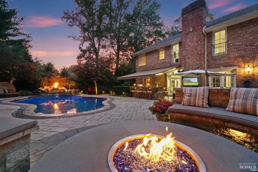 HIGHEST AND BEST DUE THURSDAY 11/16 BY 12 NOON. Welcome to this magnificent 5 BR, 4.5 Bath gated brick estate, nestled on a sprawling 0.92-acre lot, surrounded by mature landscaping ft the ultimate BKYD oasis. Built for entertaining, this home fts an ideal layout w/grand 2-story EF, DR & LR/game rm. The GR w/stately fpl & French doors to BKYD flows effortlessly into the updated EIK w/SS Appl, Carrara marble counters & sunlit bkfsr area. Convenient 1st fl office & lndry rm lead to heated 3 car garage. The 2nd floor fts 5 large Bdrms. Enter into the tranquil primary BR suite boasting a fplc, trayed ceilings, lux primary bth & expansive custom boutique-like WIC w/fpl! 4 addl lrg BRs are connected by 2 J&J Bths. No detail spared, the LL w/temp-controlled wine rm, lrg rec room w/home entm't setup & wet bar, billiard rm, bonus rm & f bth providing the ultimate space for r&r. The BKYD is a dream escape, ft large patio, gunite pool w/fire feature & waterfall, gazebo & outdoor kit.