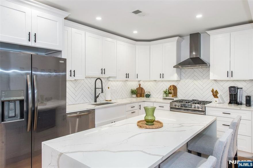 Welcome to 174 Brinkerhoff Street, A Fully Renovated Luxury Home Just 30 Minutes from NYC. Every inch of this home has been thoughtfully renovated with meticulous attention to detail, design, and execution. Pull into the oversized two-car attached garage with soaring 12+ ft ceilings, a half bath, laundry room, and brand-new high-efficiency systems for heating, cooling, and hot water. The garage is heated for year-round use, itâ€™s both functional and eco-friendly. Upstairs, a bright open-concept living area showcases a chefâ€™s kitchen with white shaker cabinets, dramatic waterfall island, stainless steel appliances, and new flooring throughout. Two generously sized bedrooms feature oversized closets for ample storage. The top level offers a flexible spaceâ€”perfect as a third bedroom, office, or bonus areaâ€”designed to adapt to your lifestyle. Major upgrades are already complete: new roof, windows, vinyl siding, electrical, and luxury-finished bathrooms. This is truly a move-in-ready home. Step outside to enjoy the new paver patio and fenced yardâ€”ideal for entertaining or private relaxation. Blending quality craftsmanship, luxury finishes, and energy efficiency, this home is the definition of turnkey living. Donâ€™t waitâ€”schedule your showing today!