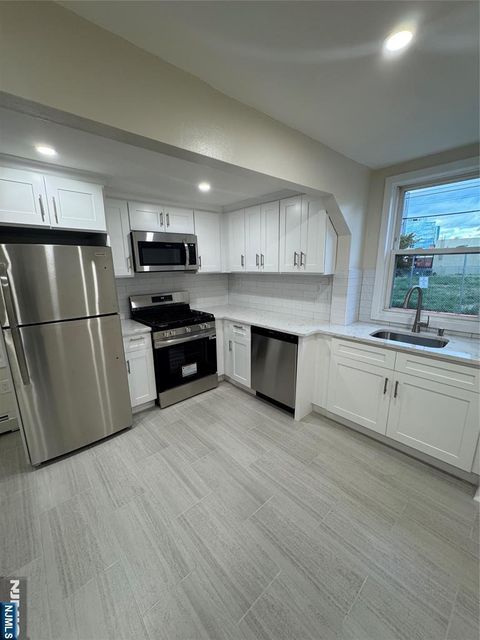 Photo of 93 Bruen St #1, Newark, NJ 07105 (MLS # 26000167)