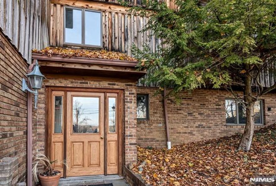 Very spacious 3 bedroom, 1.5 bath unit in the heart of Ridgewood! Close to everything location including train and town! Large living room with fireplace, updated kitchen, hardwood floors, 1 car attached garage plus additional parking. Tenants responsible for snow removal. Tenant pays utilitie. Laundry in garage.