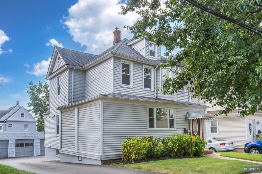 Move in ready, perfectly maintained home within walking distance to shopping and transportation. This beautiful home offers hardwood floors through out the house. 1st Floor you will find an enclosed porch, Living Room, Formal Dining Room with Kitchen with extra pantry and cabinet space. Second floor offers 3 Bedrooms with closet and Full Bath. Basement is finished with extra space for storage and Family entertaining area plus a Full Bathroom. Washer and Dryer. All appliances included. Garage for 3 cars and extra parking space.