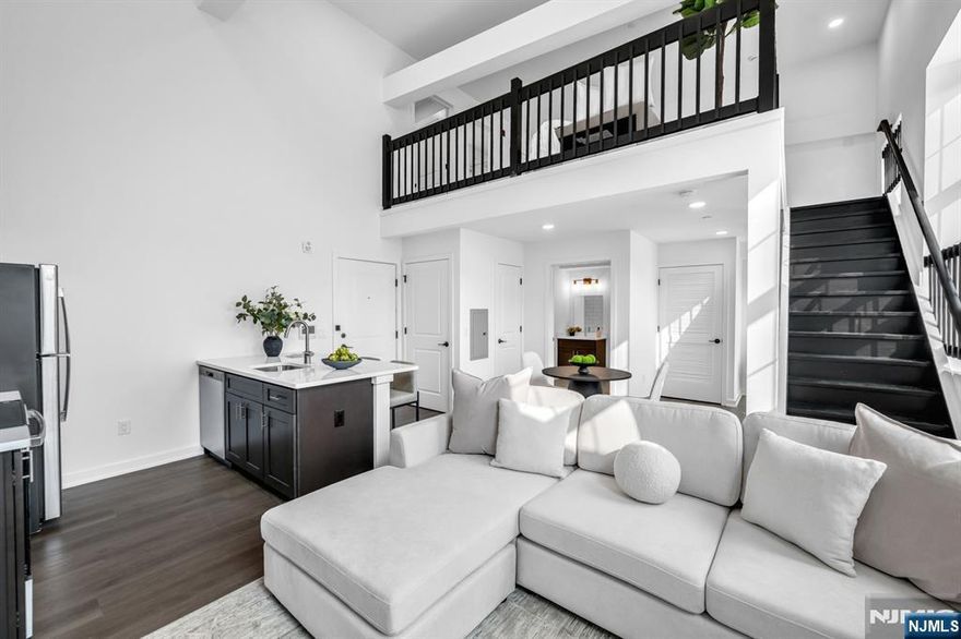 * NEW YEAR SPECIAL - ONE MONTH FREE ON A 13 MONTH LEASE OR 2 MONTHS FREE ON A 15 MONTH LEASE IF SIGNED BEFORE 1/15 & $1000 SECURITY DEPOSIT * Discover pure luxury in this stunning, new construction 1 Bedroom Loft / 2 Bathroom apartment conveniently located in highly sought after East Rutherford. Stretching across 963 SqFt, this brand new unit features lofted ceilings, gleaming wood floors, in unit washer/dryer, multi-zone heating and cooling, and plenty of sunlight throughout the day. First floor includes entry foyer, kitchen, living room, dining room, full bathroom, and laundry. Chef's kitchen features SS appliances, custom cabinets, quartz countertops, and breakfast bar. Completing this beautiful home is a second floor with bedroom, ensuite bathroom, and walk-in closet. 315 Railroad is a one-of-a-kind building featuring virtual doorman, resident patio, dog run, and ample parking. Conveniently located just steps from downtown East Rutherford & Rutherford, NJ Transit train station and bus stop, restaurants, shopping, parks, and schools. This rare opportunity is one you don't want to miss! * NEW YEAR SPECIAL - ONE MONTH FREE ON A 13 MONTH LEASE OR 2 MONTHS FREE ON A 15 MONTH LEASE IF SIGNED BEFORE 1/15 & $1000 SECURITY DEPOSIT *