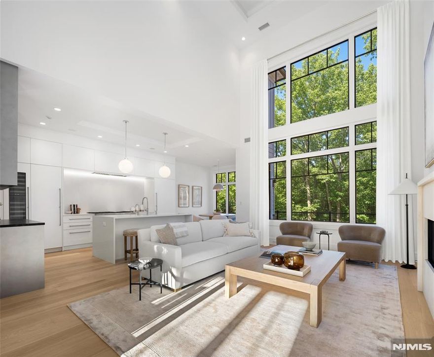 This exclusive, gated enclave of 24 newly constructed townhomes is perfectly appointed with a resident clubhouse, fitness center and private pool. Situated amidst 15 serene wooded acres with breathtaking views of the esteemed Alpine Country Club, 24 Stone Bridge Court is an 'Ascot' floor plan featuring 4 bedrooms + den/office, 4.5 baths and 2 car garage and driveway. Designer Kuche+Cucina kitchen with SubZero & Wolf appliance package, modern spa baths, 10'+ ceilings throughout, whole home generator, air filtration system, smart home technology and much more. Conveniently located minutes from Manhattan, shopping, entertainment and transportation. Developed in collaboration with Zampolin & Associates Architects and Rock Ridge Construction. At The Woodlands, luxury living and natural beauty come together in an unparalleled setting designed for those seeking the finest lifestyle.