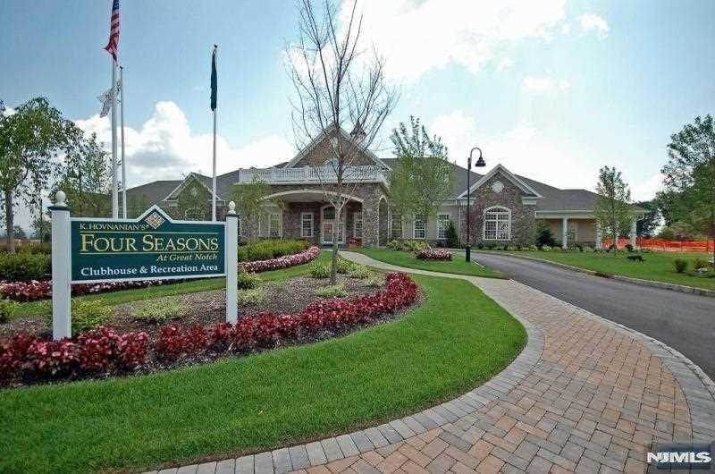 The SYRAH is the largest Villa Style Home offered in this premier gated community! Set in a peaceful location with a scenic streetscape. A sprawling layout of rooms to enjoy all on one level. Custom kitchen with plenty of cabinets & countertop space and room for a large table. A spacious primary bedroom suite with two walk-in closets, a 3rd closet & luxurious bathroom. Features include hardwood floors, decorative columns, two-car garage w/shelving & patio off the family room. Resort style living with a 25,000 sq. ft. clubhouse & the best amenities: indoor & outdoor pool, tennis/pickleball, card rooms, Mahjong, putting/driving, fitness center, grand ballroom, clubs & events. Bordering Upper Montclair with terrific restaurants, shops & boutiques. A carefree & comfortable lifestyle!