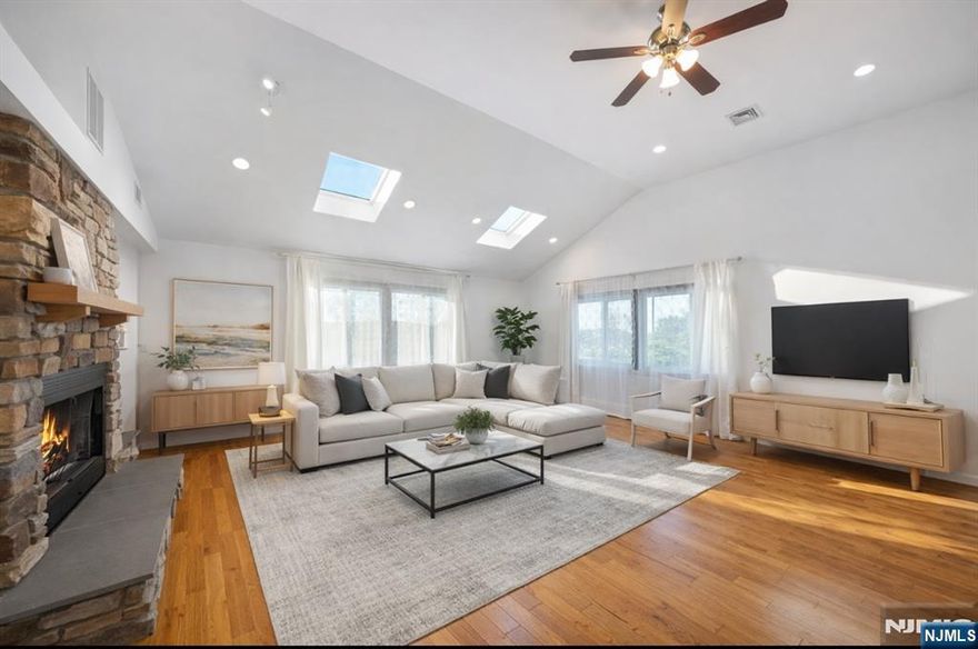 Welcome to 320-322 Dixon Avenue in Paterson, NJ. A modern two-family home built in 2013, where comfort meets opportunity. This isn't just an investment property; it's a place where life happens. Whether you're looking for a home that helps pay the mortgage or a substantial long-term addition to your rental portfolio, this one checks the big boxes. As you walk up, you'll notice the space and the convenience right away. A rare 4-car garage plus extra parking means no more juggling cars on the street. Inside, you'll find two separate units with their own utilities, giving both privacy and steady rental potential. The first-floor unit offers two bedrooms and one bath, an open living and dining layout that's easy to furnish and great for everyday living or tenant appeal. The second-floor unit feels bright and uplifting thanks to skylights and plenty of natural light, featuring three bedrooms and two full baths, room to spread out, host holidays, or create a quiet home office. If you've been hoping for a move-in-ready home with income potential, this one offers flexibility, comfort, and the chance to build equity with rental income from day one. Homes like this don't come around often. Schedule your visit and imagine what life could look like here.