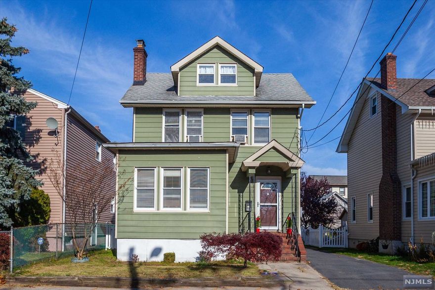 Lovely Colonial features living room, dining room, updated kitchen, 3 bedrooms, 2 updated bathrooms, brand new water heater, boiler and dishwasher and beautiful hardwood floor. Finished basement with family room, laundry room, storage room and 1 Car Garage. Close to transportation NYC and schools.