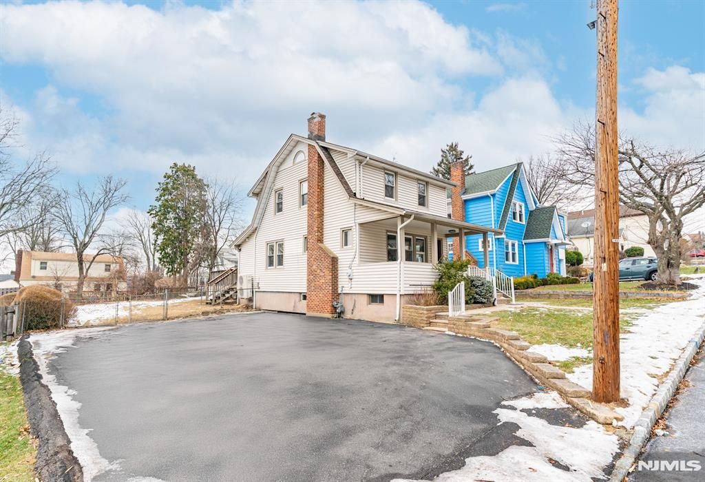 Photo of 41 Robertson Road, West Orange, NJ 07052 (MLS # 26000971)