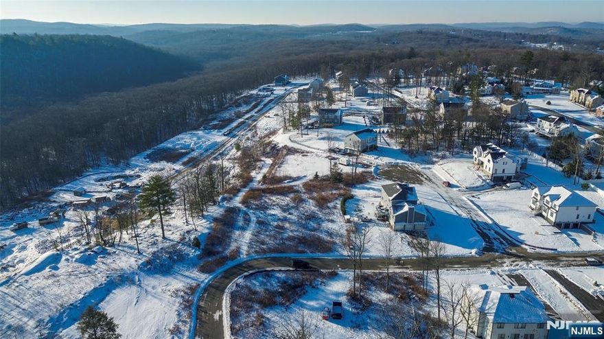 Looking for an actual amazing piece of land in a highly sought after and booming new construction neighborhood? Well here is your chance. This is the best property in the entire development. Over half an acre of flat property just waiting for a dream home and property to be developed on. A private well is already installed on the property. Public sewer and natural gas connections are available in the street, offering convenient access to essential utilities. Architectural renderings are available for illustrative purposes only and are intended to represent potential design concepts. All renderings, plans, and proposed improvements are subject to township approvals, permits, zoning requirements, and buyerâ€™s due diligence. Whether you are a builder or future homeowner looking to create a custom retreat, this property presents an excellent opportunity in a premier neighborhood with easy access to local amenities, parks, schools, and major roadways. Close proximity to multiple lakes, hiking trails, ski resorts, wineries, and SO much more! Only 1 hour from Manhattan!
