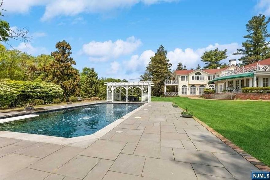 Live at this private Oasis. A magnificent Franklin Lks estate situated on 2.6acres of spectacular property.Live minutes from NYC amongst mature landscaping& rolling pasture.Originally built in the 1850's,this home has seen tasteful expansions culminating in a beautiful balance of architecture and practicality.The first floor boasts a living room&dining room both w/ fireplaces.You will be impressed w/the wood paneled great room w/ stone fireplace& beamed ceiling,stunning sunroom w/French doors leading out to deck.Updated MEIK which leads out to breakfast room w/ a wall of French doors.2 mudrooms,laudry room&2 powder rooms complete this floor.Upstairs features a mast bedroom suite w/sitting area w/fireplace,updated master bath,huge cedar closet& outside balcony.5 additional bedrooms 2 w/fireplaces,4 baths &enormous bonus rm. Outside,walk the park-like grounds complete w/gunite pool&majestic pergola w/retractable awning.Co listing agent is related to seller