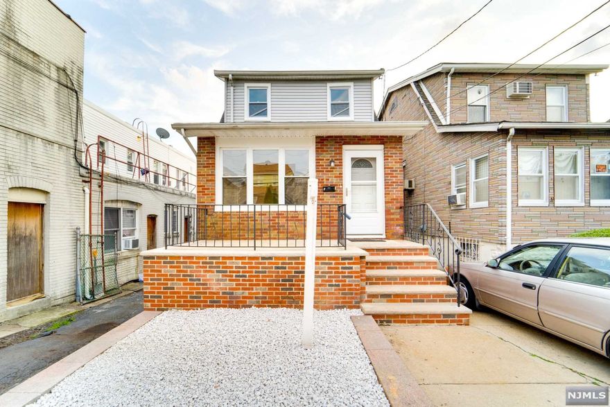 Beautifully updated colonial with large LR & DR combo with kitchen & mudroom on the 1st floor leading to the backyard. 2nd floor showcases 2 large BR with a full bath. Large full finished basement for entertaining w/exit to the backyard. Long driveway for 3 cars and beautifully landscaped backyard.