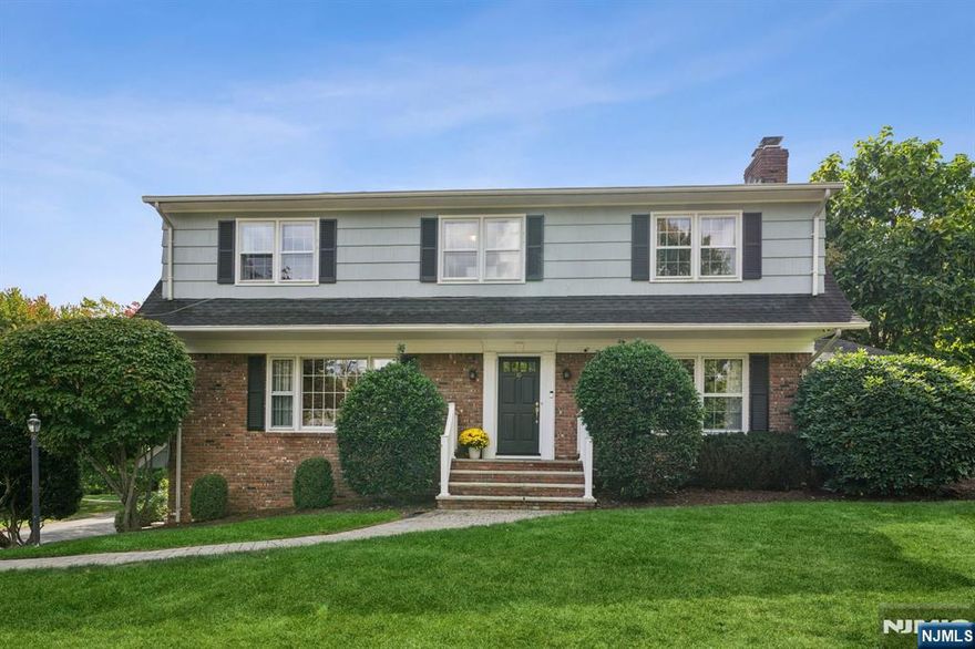 Timeless and beautifully maintained 5BR, 4.5BA Dutch Colonial set on a quiet street in one of Ramseyâ€™s most desirable neighborhoods. Perched atop a hill, this home gets natural light from almost every angle. Inside, enjoy a spacious formal living and dining room, and a warm family room with wood-burning brick fireplace - all with hardwood floors. The modern eat-in kitchen features quartz countertops, breakfast bar, high-end appliances (including a JennAir microwave/convection oven and commercial-grade Bluestar range) and overlooks the private backyard oasis with in-ground pool and paver patio. A first-floor ensuite bedroom with vaulted ceiling is ideal for guests, or for any one who just needs their own space without stairs. On the second floor are four bedrooms including a serene primary suite with walk-in closet, vanity, and renovated bath. The three additional sunny bedrooms share an updated full bath and all feature hardwood floors. The finished basement includes a full bath and flexible space for home workouts, gaming or office. Move right in and enjoy all that Ramsey has to offer: award-winning schools, quaint downtown with restaurants and shops, NYC train and recreational areas like nearby Finch Park, Campgaw ski area and Ramapo Reservation. Donâ€™t miss this classic colonial in the great town of Ramsey! Contact Listing Broker Kristin Graves for more info at 201-825-6600