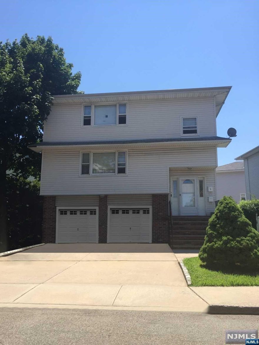 2 Family home on cul de sac with 3 bedrooms in each unit. Large Living Room/Dining Room area. Attached 2 car garage. Home being sold in "AS IS" condition with buyer responsible for all inspections and certifications needed to close.