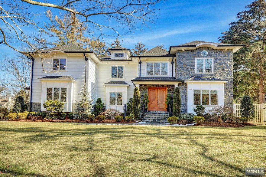 Welcome to this stunning custom built home in wonderful Haworth. As you enter this home, the 2 story entry foyer with architectural moldings sets the tone. The 1st floor features generous sized rooms including a living room,dining room,2 powder rooms,gourmet kitchen open to a wonderful family room,office/ playroom,mud room,walk in pantry & entryway to the 3 car garage.The 2nd floor offers high ceilings along with a huge primary suite including 2 walk in closets.The Primary bathroom includes a steam shower & soaking tub.Two junior suites with walk in closets,2 additional bedrooms & a large bathroom complete the 2nd floor.The lower level offers a rec room,a bedroom which is currently being utilized as a gym, a welcoming laundry room & full bathroom. Sliding glass doors off the kitchen allows direct access to the paver patio and oversized fenced in yard. A few blocks from Northern Valley Demarest HS,a few blocks from transportation & a generator complete this absolutely stunning home