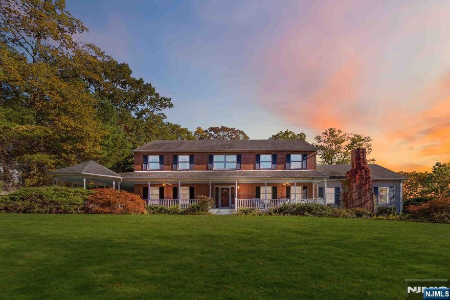 Lakefront Colonial with Breathtaking Mountain Views! Discover this beautiful 4-bedroom, 2.1-bath Center Hall Colonial perfectly set on a peaceful lakefront property with amazing mountain views. A welcoming lemonade porch sets the tone for the warmth and character found throughout this home. Step inside to a bright and open layout featuring a great room with cathedral ceilings, a wood-burning fireplace, and walls of windows framing the incredible scenery. The window-filled game room is the ideal spot for entertaining or relaxing while soaking in the lake views. The spacious kitchen and adjoining dining areas are designed for gathering, while the formal living room offers a more intimate setting. Upstairs, the primary suite is a private retreat with picturesque water views, and three additional bedrooms provide comfort and flexibility for guests or family. Enjoy the outdoors year-round from multiple vantage points â€” whether relaxing on the porch, hosting lakeside gatherings, or watching sunsets over the mountains. A 3-car garage completes this one-of-a-kind property that blends elegance, comfort, and natural beauty. LSp Sergio 201-707-2337 for a private showing