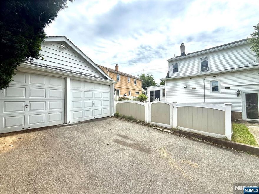 Welcome to this charming Colonial-style home located in one of Bergen County's most desirable towns. Its corner log with 2 car garage and full finished basement and additional sunroom. We lowered price to find someone who is motivated as first buyer could not perform on mortgage. Once you enter, you will Step inside to find a cozy living room and a bright, sun-filled family room. The updated kitchen features granite countertops, new tile flooring, and stainless-steel appliances. New engineered flooring enhances the living and dining rooms, while the family room boasts wood laminate flooring. Upstairs, all three bedrooms offer hardwood floors for a classic touch. Additional highlights include new interior doors, a detached two-car garage, and a spacious driveway providing ample parking. A walk-in attic offers generous storage space. The home is also equipped with a sprinkler system for added convenience. Roof is only 9 months old. new furnace and boiler too