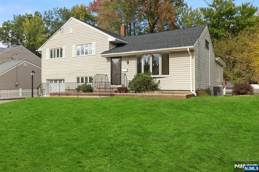 Photo of 6 Meadow Drive, Little Falls, NJ 07424 (MLS # 25037723)