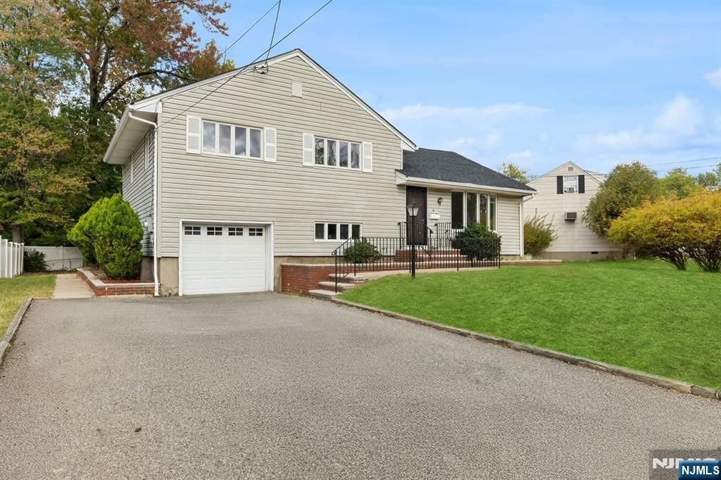 Photo of 6 Meadow Drive, Little Falls, NJ 07424 (MLS # 25037723)