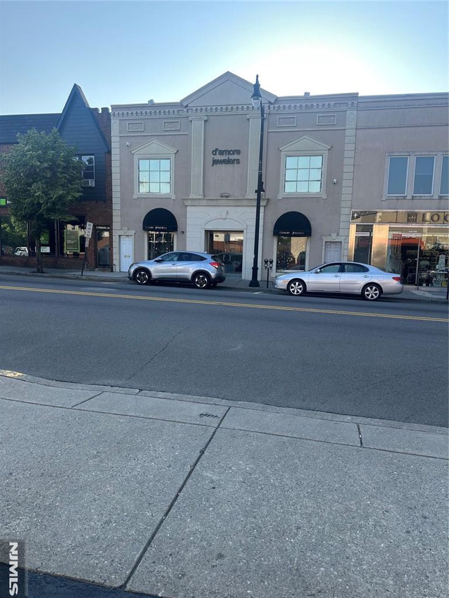 Great opportunity to invest in a modern mixed use building in the downtown center of Cliffside Park. Luxurious showroom consisting of 4000+/- sq. ft. retail space. Originally two buildings converted into one large space which could be returned to two retail units commanding higher rents. Full basement with bath. There are a total of four one bedroom apartments on the second floor. One apartment has been updated, two units were recently constructed, the fourth is 75% completed. It will be the largest and can be rented quickly .All apartments have separate entrances from the retail store. Anderson Ave is a highly trafficked street .The new Town Center consisting of luxurious apartments and retail stores as well as the Municipal Parking Garage is one block away . NYC bus stop at doorstep. Perfect investment for an owner operator or a savvy investor. Retail space also available for lease.