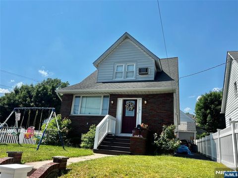 Photo of 103 Chamberlain Avenue, Paterson, NJ 07502 (MLS # 26018076)
