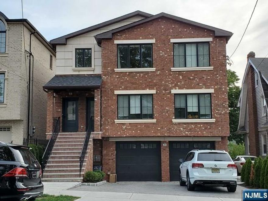 LIKE BRAND NEW 2FAMILY HOUSE ON THE 1ST FLOOR. MODERN AND EXQUISITE DESIGN. OPEN LAYOUT WITH FINEST MATERIALS AND APPLIANCES. CENTRAL HEATING AND A/C, LARGE DECK, FIRE PLACE, WASHER/DRYER IN UNIT, ONE CAR GARAGE AND DRIVEWAY IS INCLUDED, USE OF BACKYARD. CONVENIENTLY CLOSE TO NY EXPRESS BUS, SCHOOL, MAJOR HIGHWAYS, SHOPPING. LANDLORD MAY CONSIDER A SMALL DOG.