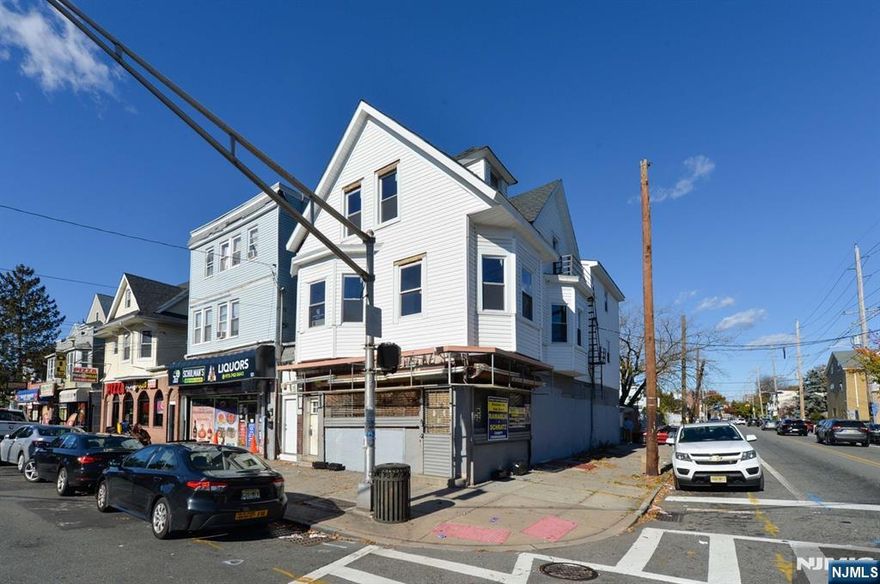 Mixed-Use Building Offers Exceptional Income Potential And Is Situated On A Corner Lot For Maximum Visibility And Accessibility. Each Residential Unit Features 5 Bedrooms, New Kitchen, Living Rm And Updated Bath. Perfect For Large Households Or High-Yield Rental. First Floor Is A Commercial Space With Street-Level Access For Office Or Service Based Business. Excellent Exposure On A Busy Corner With Plenty Of Foot Traffic. Newer Furnaces And Updated Electric. Updated Interiors Reduce Maintenance Costs. Mixed-Use Zoning Offers Flexibility And Long-Term Value. Easy Access To Highways, Transportation, Shopping & Local Amenities. **LOW TAXES 4895.**