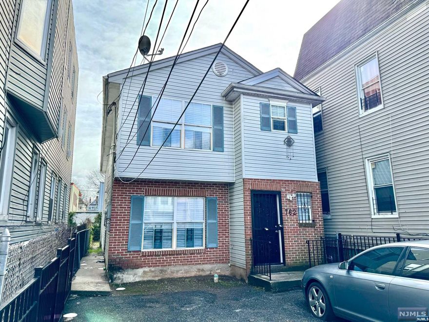 Great two family vacant ready to move in one and rent other. Recently with refinished flooring, doors, and painted through out. Unit 1 features living room, kitchen, two bedrooms and one bath. Unit 2 featuring - living room, kitchen, three bedrooms and two baths. Separate utilities and two car side by side driveway. Low Taxes! Close to Parks, restaurants, shopping, public transportation, major highways and NYC commute.To preview this property, please call Ascensao Gutierrez at 973-207-0956