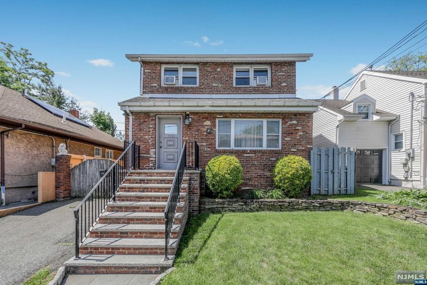 Nestled in a picturesque neighborhood, this charming single-family home exudes timeless elegance. As you enter through the entry foyer, you're immediately greeted by the warmth of a spacious living room adorned with a majestic fireplace, formal dining room with built in bar area, large eat in kitchen with door leading to a patio overlooking the beautiful inground pool and a powder room completes the first floor. Ascending the staircase to the second floor, a master bedroom with a private dressing area and double closets, two additional bedrooms and a full bath. The yard features an inground pool and professionally landscaped gardens. Whether lounging poolside on sun-drenched afternoons or hosting gatherings, the backyard is a haven for outdoor enjoyment and effortless entertaining. Conveniently located to highways and NYC transportation. A must see!