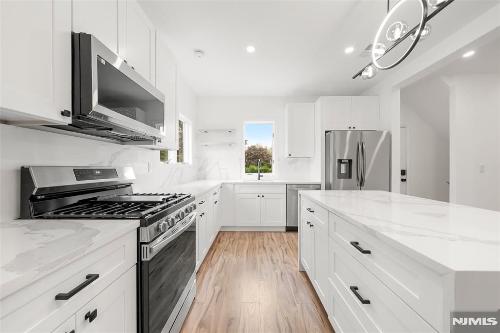 Photo of 174 Pleasant Avenue, Bergenfield, NJ 07621 (MLS # 25040865)