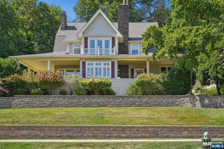 Perched on the upper side of Lloyd Road, this stunning home offers sweeping views of the NYC skyline while giving a sense of privacy and serenity at the same time. 46 Lloyd Road features 5 bedrooms, 4 Full bathrooms & 2 half bathrooms with two front porches offering views to that you must see. All rooms are extremely spacious giving you a feeling of comfort while making this your home. The backyard is set for you to enjoy - there is a hillside deck to enjoy the stars or NYC skyline. Or simply relax with friends and family on the patio in privacy.This is a fabulous home so come see for yourself.