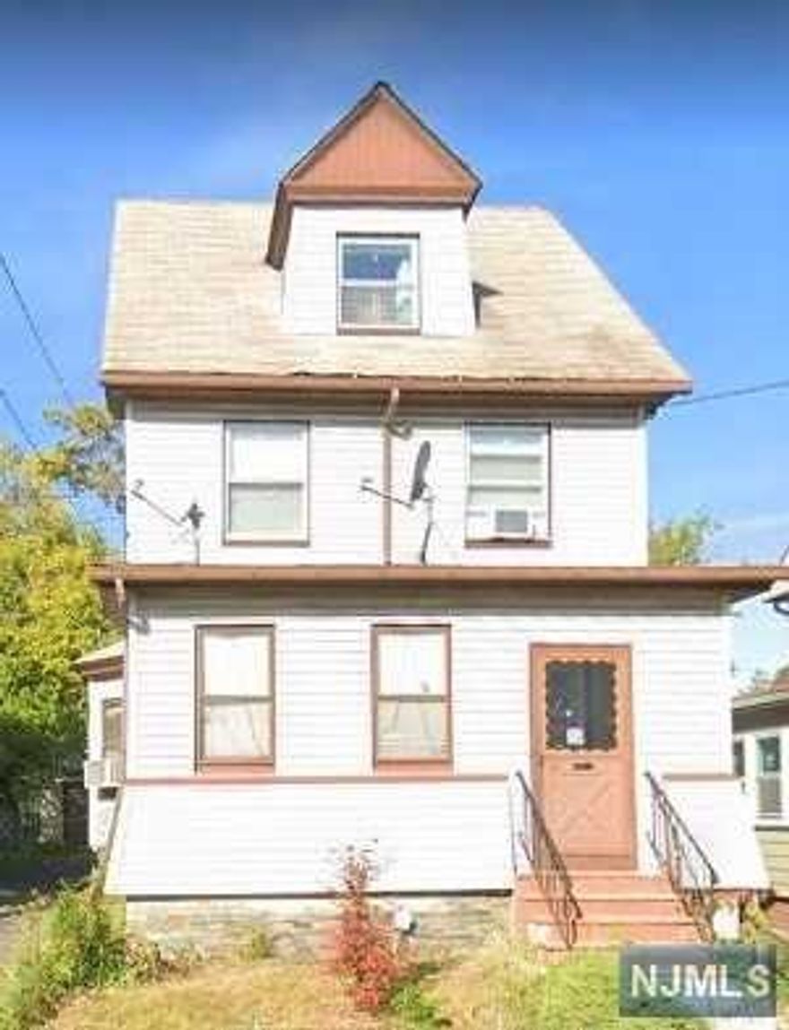 This impressive colonial located in desirable upper Irvington boasts of high ceilings, stained glass windows, 4 bedrooms that includes an oversized master, 2 full baths, eat in kitchen with custom peninsula and 4 year old range with griddle-gorgeous wood burning fireplace, spacious 2 car garage, serene backyard and plenty of additional off street parking. Walking distance to schools, shopping, and public transportation. Great for first time home buyer or for anyone who's looking for a forever home. This beauty won't last! Needs work but, PRICED TO SELL!!! Property is being sold "As Is". No known defects but, fireplace/chimney/flue is "As Is".