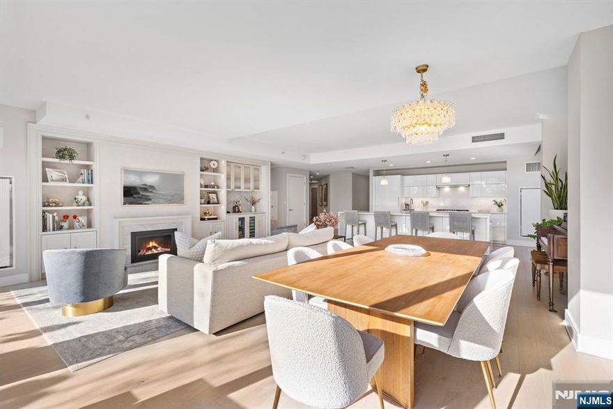 Terrace Home 316, a single-level residence spanning an impressive 2410 sqft in the exclusive Port Imperial community. Homes of this size, style, and layout are seldom available. The open floor plan is designed for effortless living and entertaining, with beautifully crafted custom built-ins enhancing the homeâ€™s sleek functionality. Floor-to-ceiling windows flood the interior with natural light and offer a stunning connection to the outdoors. The expansive 472 SF terrace, conveniently located off the living room, creates a seamless indoor-outdoor flow. Residents enjoy exceptional 40,000 SF of resort-style amenities, including a 24/7 concierge, multiple resident lounges, an infinity pool, a 6,000 sq. ft. fitness center with a yoga studio, aerobic studio, and weight room, two saunas, a thoughtfully designed play area for children, two landscaped community decks with fire pits and BBQs all overlooking The Greatest City in The World.