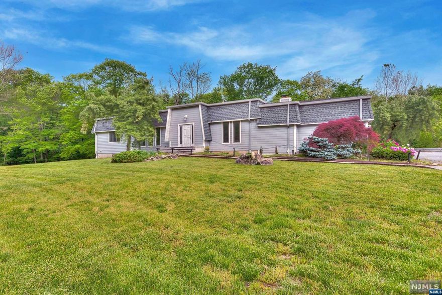 A great opportunity to live in the prestigious town of Saddle River with a Blue Ribbon School System and the best taxes. A raised Ranch Style home featuring 5 bedrooms and 3 1/2 bathrooms. A very bright open floor plan New kitchen, stainless steel appliances and 2 updated bathroom. A walkout lower level, partially finished, a second living area with a fireplace or to accommodate an extended family with 2 additional bedrooms, office/bedroom and full bath. You will fall in love with the privacy, the serenity of the river and the pond in your backyard where you can kayak and enjoy the seasonal views. Newer septic! Call Helen @ 201-615-5188 for a private showing.