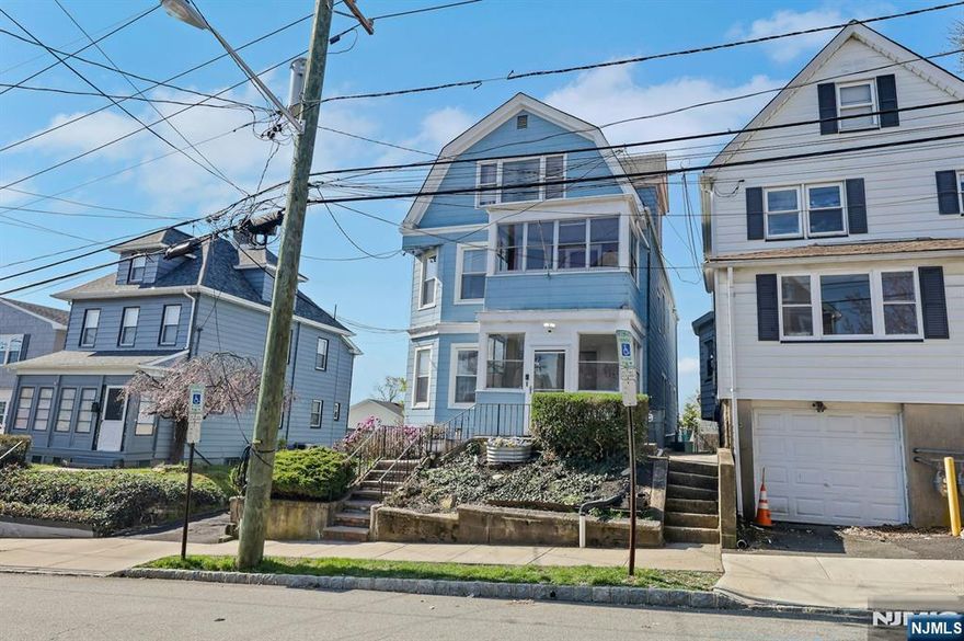 Great 2-family residence in a convenient location, complete with a versatile bonus third floor offering endless possibilities. This home has a total of 6 bedrooms and 3 full bathrooms. Both units offer a living room, dining room, 2 bedrooms, kitchen, and bathroom. The 2nd floor has an additional enclosed porch. The third floor, used in conjunction with the 2nd floor, adds exceptional value with an additional 2 bedrooms, a den, and a full bath. The property also features an oversized unfinished basement, and a cozy backyard with a deck & storage shed. 2 separate gas steam radiator heating systems, 2 water heaters & 2 electric & gas meters. The entire dwelling will be delivered vacant at closing!! Conveniently located near shops, dining, parks, schools, and bus transportation that can get you to NYC in about an hour! Not in a flood zone. No garage no driveway