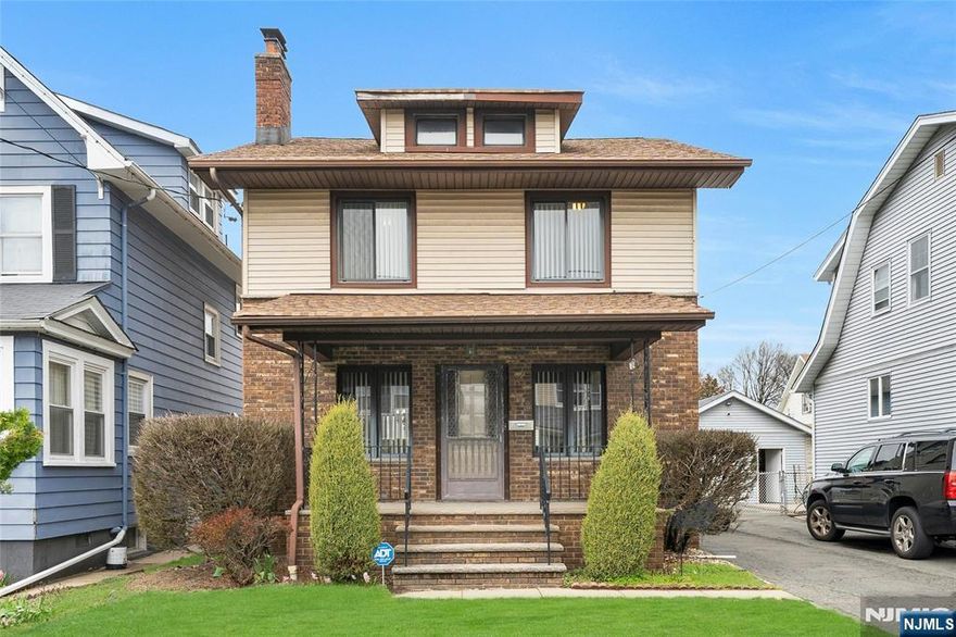 Welcome to this charming 3-bedroom, 1.5-bath Colonial nestled in the highly sought-after Halcyon Park neighborhood of Bloomfield. This neighborhood centers around a scenic park and pond, creating a peaceful, storybook setting that feels tucked away yet remains incredibly convenient. The first floor features a spacious, light-filled living room with wood burning fireplace, a large formal dining room, and a well-appointed kitchen with ample cabinet space. Beautiful original moldings add warmth and architectural charm throughout the home. Upstairs, you'll find three bedrooms and a full bath. Beneath the carpeting, original hardwood floors are waiting to be uncovered and restored to their full beauty. Additional highlights include CA conditioning, a security system, and a full semi-finished basement with a convenient half bath & Laundry room, offering excellent storage or additional living space. Step outside to enjoy a large deck overlooking the private backyard perfect for relaxing or entertaining. An oversized garage provides ample space for parking, storage, or a workshop. Conveniently located within walking distance to multiple transit options, including Watsessing Avenue Station (10 min), Grove Street Light Rail (12 min), and Bloomfield Center, Lackawanna Plaza (18 min), offering easy access to NYC, Newark, and beyond. Make this charming property uniquely yours! ***Final & Best Offers due Tuesday, April 14th @4pm. See document section for Offer Guidelines.