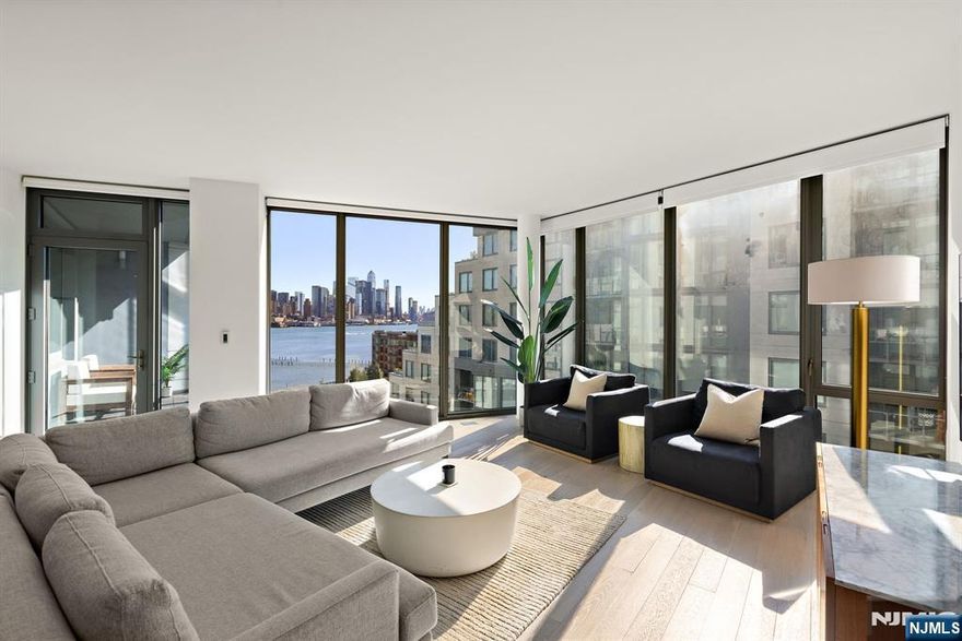 Introducing an exquisite home featuring unique full-panel glass floor-to-ceiling windows, offering stunning protected panoramic views of Midtown and Downtown Manhattan to the southeast! This stunning residence boasts a high-end kitchen equipped with custom Italian Pedini cabinetry, generous Aspen quartz stone countertops with a waterfall edge, and a Bosch appliance package, including a Thermador built-in refrigerator, ideal for cooking enthusiasts. Pamper yourself in two luxurious en-suite bathrooms with Carrara marble floors and walls, custom Italian Pedini vanities topped with quartz countertops, and Moen faucets complemented by luxurious rain shower heads. The spacious bedrooms offer ample closet space, and the entire home is adorned with beautiful oak flooring throughout. Modern Restoration Hardware lighting fixtures and the convenience of in-unit laundry complete the package. Residents enjoy exceptional 40,000 SF of resort-style amenities, including a 24/7 concierge, multiple resident lounges, an infinity pool, a 6,000 sq. ft. fitness center with a yoga studio, aerobic studio, and weight room, two saunas, a thoughtfully designed play area for children, two landscaped community decks with fire pits and BBQs, all overlooking The Greatest City in The World. Benefit from an estimated 1% tax abatement through 2038