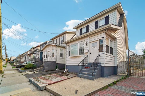 Photo of 106 Paine Avenue, Irvington, NJ 07111 (MLS # 26034933)