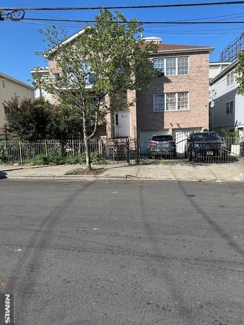 Photo of 8991 Hawthorne Avenue, Newark, NJ 07112 (MLS # 25031647)