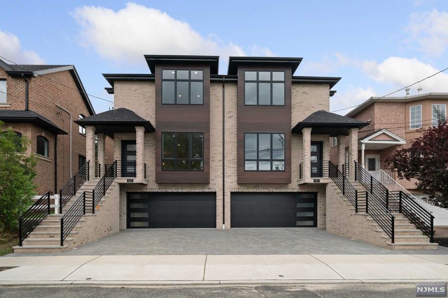 446 2nd Street, A BRAND NEW CONTEMPORARY BRICK TOWNHOME FEATURING 3,000 SQUARE FEET OF LIVING SPACE. THIS HOME BOASTS AN OPEN FLOOR PLAN WITH 9 FOOT CELINGS ON THE FIRST FLOOR, GOURMET KITCHEN WITH WET BAR, AND CUSTOM CABINETS, LG APPLIANCES, QUARTZ COUNTERTOPS, AND DECK WITH A STAIRCASE TO THE BACK YARD. MASTER SUITE WITH THREE WALK IN CLOSETS, HIS AND HER SHOWER, DOUBLE KOHLER VANITIES WITH RADIANT FLOOR HEAT...ADDITIONAL 2 BEDROOMS WITH HALLWAY BATH...GROUND LEVEL FINISHED WITH RECREATION ROOM, BONUS OFFICE OR BEDROOM, BATH, AND SIDE ENTRANCE....HOUSE IS EQUIPPED WITH FOUR ZONE HEATING AND ONE ZONE COOLING SYSTEM, CENTRAL VAC, LED LIGHTING, OAK HARDWOOD FLOORS, AND MOLDING PACKAGE. TANKLESS HOT WATER HEATER AND BOILER. OWNER HOLDS REAL ESTATE LICENSE