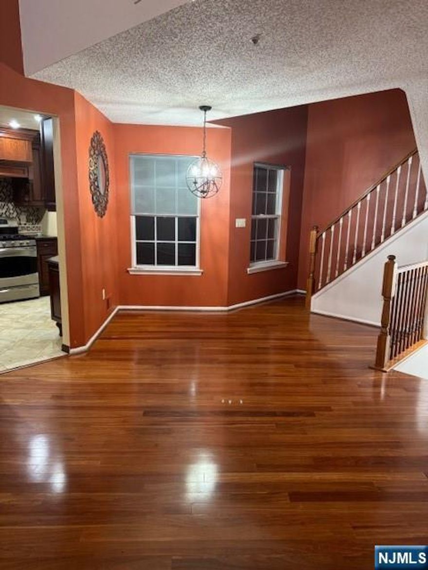 Discover this beautifully maintained 3-bedroom, 3-bathroom condo in the highly sought-after Paddington Square community in Mahwah. Spanning three spacious levels, this light-filled home features soaring ceilings and an open, airy layout designed for both comfortable living and effortless entertaining. The main living area offers a cozy fireplace and direct access to a private terraceâ€”perfect for relaxing or hosting guests. Upstairs, a versatile loft provides the ideal space for a home office, den, or creative retreat. Residents enjoy access to Paddington Squareâ€™s exceptional amenities, including a pool, playground, and clubhouse. Ideally located near shopping, dining, and major transportation, this home offers the perfect blend of convenience and lifestyle. Two assigned outdoor parking spaces are included. Schedule your private tour today and make 1026 Castle Hill Road your next home.