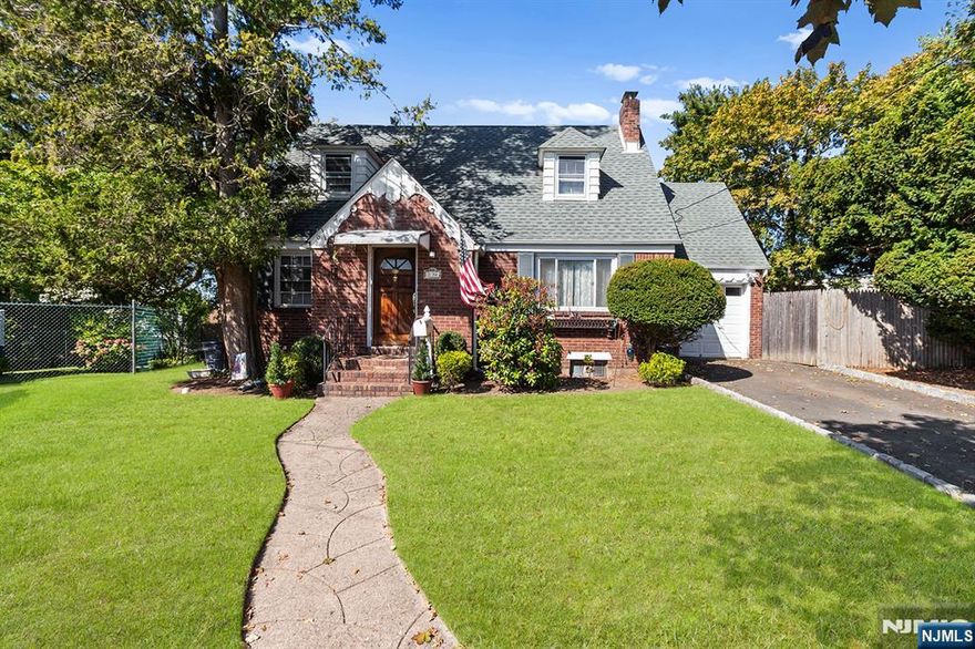 Come and see this amazing home nestled on a beautiful cul de sac! Featuring a cozy fireplace, hardwood floors throughout, a charming three season room, a large backyard, and so much more. Donâ€™t miss the chance to make this gem your new home!