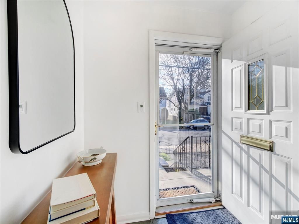 Photo of 121 Woodland Avenue, Rutherford, NJ 07070 (MLS # 25043130)