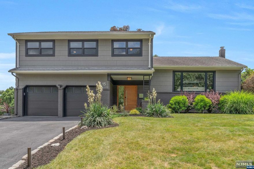 Welcome to The Contemporary Classic in Verona, NJ - Luxury custom details. Enter through custom entry door with biometric keypad into a welcoming foyer that leads to a generously sized living room, complete black stain hardwood floors and ample natural light, perfect for both relaxing and entertaining. Ground floor family room opens out into the outdoors. A chef's delight kitchen (2016) boasts luxury line stainless steel appliances and granite countertops. Originally built as 4 bedrooms (2 bedrooms combined as 1 by previous homeowner), including a bedroom suite with bathroom. Finished basement. Landscaped backyard features a patio area, with a TV and barbecue area. Top-rated schools, Verona Park, shopping, dining, and NYC public transportation. Improvements: Anderson black line windows (2019), , all bathrooms updated (2019), light fixtures (2019), new garage doors (2019), CAC (2016) Fujitsu mini split AC, exterior professionally painted (2016), Hudson Bay Spa (2020), fence (2018).