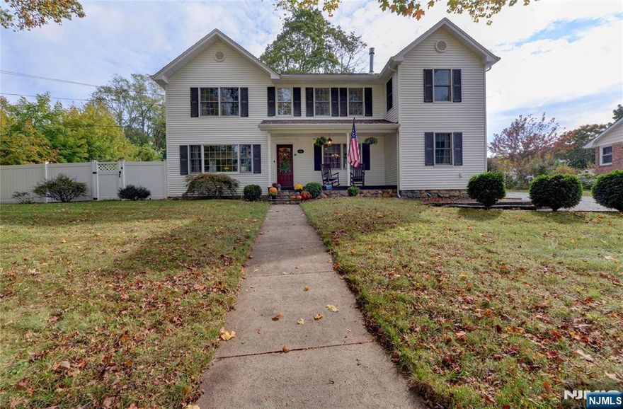 Welcome to your dream Colonial home, perfectly situated in a picturesque setting. Spanning 2,352 sq. ft., this home greets you with original stone pillars as you pull into the driveway. The inviting open front porch is an ideal spot to enjoy your morning coffee. Upon entering, you're welcomed by a foyer that leads into a formal dining room, and open to the kitchen. The spacious front-to-back living room w/pellet stove, high hat lighting and French sliders to rear paver patio and yard. The kitchen is a chef's delight, boasting stylish concrete-style countertops that blend aesthetics and functionality. It includes a breakfast bar and ample cabinet space to meet all your storage needs. A full bath, a versatile bedroom that can also function as a home office, plus a mudroom that offers plenty of storage. Step outside through the sliders to paver patio overlooking the yard and inground pool. On the second floor, you'll discover the primary bedroom with a sitting room, two additional bedrooms, and a family room adjacent to a full laundry room equipped with extra cabinets and a sink. The property also features a detached two-car garage.This home has been thoughtfully updated and is in excellent condition, ready for you to move in and personalize. Ideally located just moments from major highways, shopping, and schools, this Colonial beautifully combines classic charm with modern amenities. Don't miss out on the opportunity to make this exceptional property your new home!