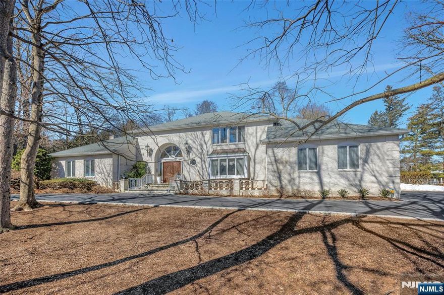 Rarely does a residence of this caliber offering a true 1st-floor primary wing and artisan-quality Ulrich spa bath become available in such a coveted Franklin Lakes location.510 Hampton Hill Rd, a sophisticated estate in the heart of Franklin Lakes, offering approx. 5,800 sq ft of refined living. A circular drive leads to a grand double-door entrance & reception area, establishing an atmosphere of high-end design & inviting ambiance.Centered around a rare 1st floor primary wing, the layout features a private sanctuary with a gas fireplace, dual custom closets, & artisan-quality renovated Ulrich bath. The sun-drenched, multi-level Great Room offers soaring ceilings & dual sliders to an expansive patio. The main fl is completed by a curated dining room with an inviting bay window, bright eat-in kitchen with a sliding door to the patio, versatile den-Living Room, laundry suite, & 2 guest baths.Featuring front & rear staircases for effortless flow, the 2nd fl offers an en-suite bedroom plus 3 add'l well-appointed bedrooms & a shared bath. The massive lower level is a blank canvas for a multi-gen lifestyle, ideally suited for a state-of-the-art gym/wellness ctr, wine cellar, & tasting space, with room for add'l possibilities.Situated on flat, private grounds with lush landscaping, this move-in ready home features a whole-house generator & a heated 2-car garage. Located near top-rated schools, premier shopping, & diverse recreational opportunities.