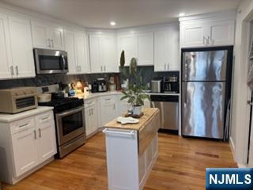 New construction apartments featuring an open concept living room, kitchen, full bathroom, washer and dryer in unit and parking space! Hardwood floors throughout, split heating and cooling system, intercom system, exercise room, conference room, storage and elevator.