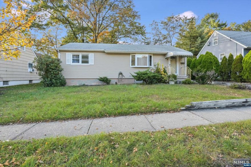 PRIME LOCATION FOR COMMUTERS!! This Ranch style home is just steps away from Hawthorne Station and conveniently located near other NYC transportation, major highways, schools and shopping! Enter into the living room with large windows that allow for plenty of natural light to fill the room! Hardwood floors rung throughout most of the Cased opening leads into kitchen with plenty of cabinetry storage and separate dining area. Bedroom is located just off of the kitchen with ample closet space. There are 2 additional bedrooms on the other side of the house through the living room. You will also find a full bathroom with tub shower and storage vanity. The basement is fully finished offering den area or additional storage space. The backyard is totally private and offers level yard perfect for any outdoor activity. There is a 1-car detached garage with ample driveway parking.