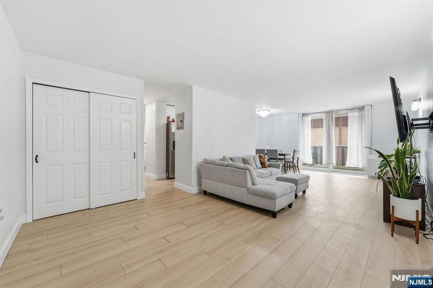 Fully Renovated 3-Bedroom Condo in Prime Commuter Location " All Utilities Included in HOA! This move-in-ready home features 3 spacious bedrooms and 2 top-notch full bathrooms, thoughtfully designed for modern living. Step inside to an inviting open-concept layout featuring a bright formal living room that flows seamlessly into a formal dining area. The dining room faces a charming private balcony, ideal for enjoying your morning coffee or unwinding after a long day. Just off the main living space, you'll find a separate modern galley-style kitchen equipped with stunning appliances, including a stove, refrigerator, dishwasher, and microwave. The oversized primary suite offers comfort and privacy, complete with a beautifully updated en-suite full bathroom and generous closet spaces. Two additional well-sized bedrooms share a sleek, modern full bathroom conveniently located in the hallway. Enjoy year-round comfort with forced hot air heating and central ductless A/C units. Laundry room located in the third floor. Includes 1 private off-street parking space. Exceptional Location with Easy NYC Access. Short walk to the NJ Transit North Elizabeth Train Station. Commuting ease, the 112 Bus to New York stops right outside. The property is also ideally situated near schools, daycares, shopping, and restaurants. This fully renovated condo delivers space, style, and an unbeatable location.